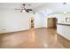 Open living room with hardwood floors and a fireplace at 5085 Bone Ln, Brooksville, FL 34604