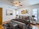 Main bedroom with hardwood floors and ceiling fan at 5085 Bone Ln, Brooksville, FL 34604