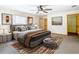 Main bedroom with large bed and walk-in closet at 5085 Bone Ln, Brooksville, FL 34604