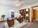 Home office with built-in shelving and large desk at 5085 Bone Ln, Brooksville, FL 34604