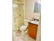 Clean bathroom with a glass shower and updated vanity at 5945 21St N St # 2, St Petersburg, FL 33714