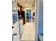 Clean and bright kitchen with stainless steel appliances and view into dining area at 5945 21St N St # 2, St Petersburg, FL 33714