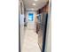 Modern kitchen with stainless steel appliances and light flooring at 5945 21St N St # 2, St Petersburg, FL 33714