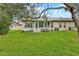 Backyard view showing patio and part of house at 6218 Hardscrabble Ct, Spring Hill, FL 34606