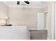 A bright bedroom with neutral walls, and carpet flooring at 692 Challice Dr, Spring Hill, FL 34609