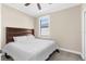 Bright bedroom with a window and a well-lit atmosphere at 692 Challice Dr, Spring Hill, FL 34609