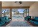 Inviting screened porch with comfortable seating overlooking a sparkling pool at 692 Challice Dr, Spring Hill, FL 34609