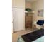 Spacious bedroom with double door closet and carpeted floor at 7221 Cleopatra Dr, Land O Lakes, FL 34637