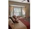 Spacious bedroom with bay window and ample light at 7221 Cleopatra Dr, Land O Lakes, FL 34637