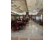 Large community room with tables and fireplace at 7221 Cleopatra Dr, Land O Lakes, FL 34637