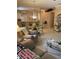 Comfortable living room with a view into the kitchen and dining area at 7221 Cleopatra Dr, Land O Lakes, FL 34637