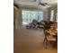 Relaxing living room with sliding glass doors leading to a patio at 7221 Cleopatra Dr, Land O Lakes, FL 34637