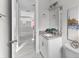Modern bathroom with granite countertop, white cabinets, and stylish fixtures at 8290 40Th N St, Pinellas Park, FL 33781