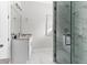 Bright bathroom featuring a walk-in shower and granite countertop at 8290 40Th N St, Pinellas Park, FL 33781