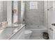 Bathroom with white cabinets, granite countertop and bathtub at 8290 40Th N St, Pinellas Park, FL 33781