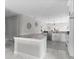 Modern kitchen featuring white cabinets and expansive island at 8290 40Th N St, Pinellas Park, FL 33781