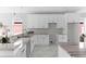 Bright kitchen featuring white cabinets and granite countertops at 8290 40Th N St, Pinellas Park, FL 33781