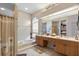 Large bathroom with double vanity and jacuzzi tub at 8540 Caitlin Ct, Hudson, FL 34667