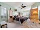 Spacious Primary bedroom with built-in storage and mirrored closet at 8540 Caitlin Ct, Hudson, FL 34667