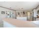 Bright kitchen featuring an island, built-in shelving, and plenty of counter space at 8540 Caitlin Ct, Hudson, FL 34667