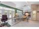 Bright living room with pool view and comfortable seating at 8540 Caitlin Ct, Hudson, FL 34667