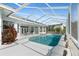 Inviting screened pool area with ample patio space at 8540 Caitlin Ct, Hudson, FL 34667