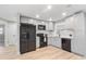 Modern kitchen featuring new appliances and cabinetry at 9240 Whitman Ln, Port Richey, FL 34668