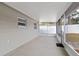 Screened patio with backyard access and ample space at 9240 Whitman Ln, Port Richey, FL 34668
