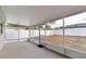 Screened-in patio overlooking backyard; great for outdoor enjoyment at 9240 Whitman Ln, Port Richey, FL 34668