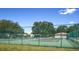 Two well-maintained tennis courts at 9327 Whitstone Ct, New Port Richey, FL 34655