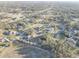 Sprawling community featuring single-Gathering homes, mature trees and landscaping, and tranquil neighborhood streets at 9376 Bearwalk Path, Weeki Wachee, FL 34613