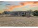 Screened-in pool and patio, perfect for entertaining, is attached to home and overlooks a large backyard at 9376 Bearwalk Path, Weeki Wachee, FL 34613