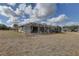 Home with large backyard, screened pool, and open space at 9376 Bearwalk Path, Weeki Wachee, FL 34613