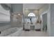 Bathroom with a large soaking tub, shower, and double vanity at 9376 Bearwalk Path, Weeki Wachee, FL 34613