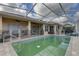 Relaxing screened pool with patio furniture and plenty of space at 9376 Bearwalk Path, Weeki Wachee, FL 34613