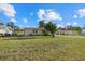 Charming home with a well-maintained front yard and mature landscaping at 106 Aurora E St, Venice, FL 34285