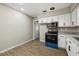 Well-lit kitchen with modern appliances and ample counter space at 106 Aurora E St, Venice, FL 34285
