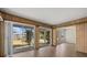 Bright living room featuring sliding glass doors to the backyard at 106 Aurora E St, Venice, FL 34285