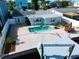 Aerial view of waterfront home with private pool and dock at 13410 Sunfish Dr, Hudson, FL 34667