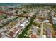 Aerial view of waterfront community with canal access to bay in a residential neighborhood at 13802 Judy Ave, Hudson, FL 34667