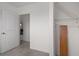 Bedroom with a closet and view into another room at 15806 Adobe Dr, Hudson, FL 34667