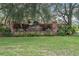 Welcome to Autumn Oaks, a deed-restricted community with lush landscaping and a brick entrance sign at 18242 Autumn Lake Blvd, Hudson, FL 34667