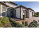 Front entry with screened porch, brick walkway and landscaping at 19293 Ship Wheel Way, Land O Lakes, FL 34638