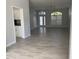 Living room view showcasing tile floors and an entryway at 2339 Grandfather Mtn, Spring Hill, FL 34606