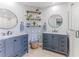 Modern bathroom with double vanity and walk-in shower at 2647 Royal Ridge Dr, Spring Hill, FL 34606