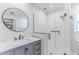 Modern bathroom with a large walk-in shower and marble vanity at 2647 Royal Ridge Dr, Spring Hill, FL 34606