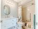 Bathroom with bathtub, toilet and vanity with marble top at 2647 Royal Ridge Dr, Spring Hill, FL 34606