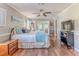 Spacious main bedroom with wood floors and plenty of light at 2647 Royal Ridge Dr, Spring Hill, FL 34606