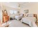 Guest bedroom with twin beds and ample natural light at 2647 Royal Ridge Dr, Spring Hill, FL 34606