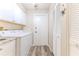 Functional laundry room with washer, dryer, and storage at 2647 Royal Ridge Dr, Spring Hill, FL 34606